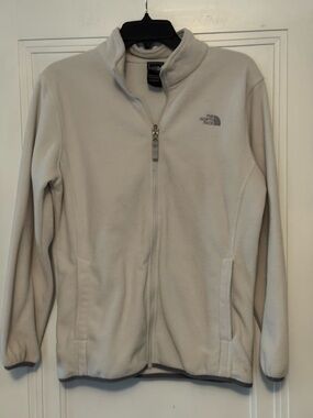 The North Face off white fleece jacket in women’s size medium.